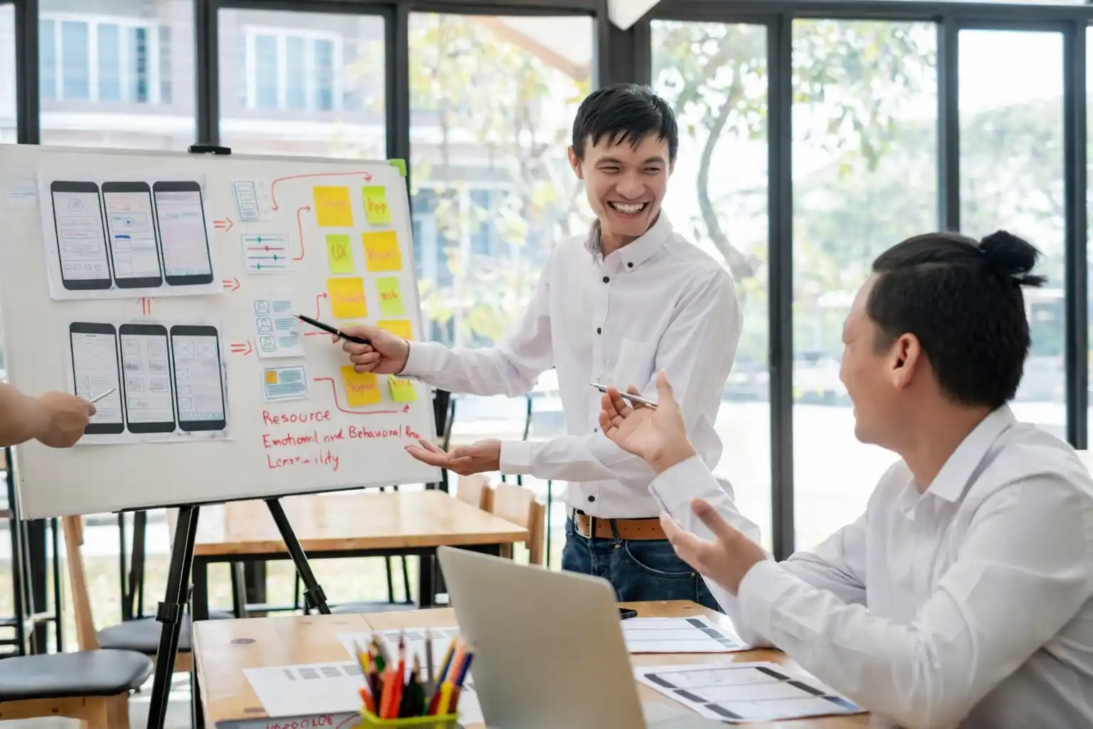 Investors evaluating long-term growth and fundamentals during a strategic discussion.