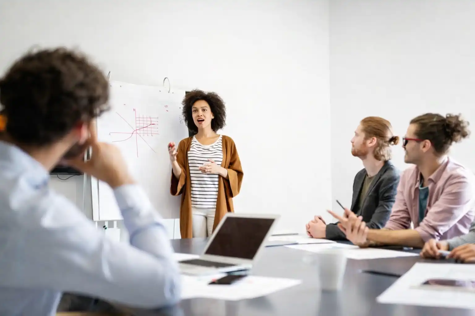Team members engaged in a strategic discussion during a planning session